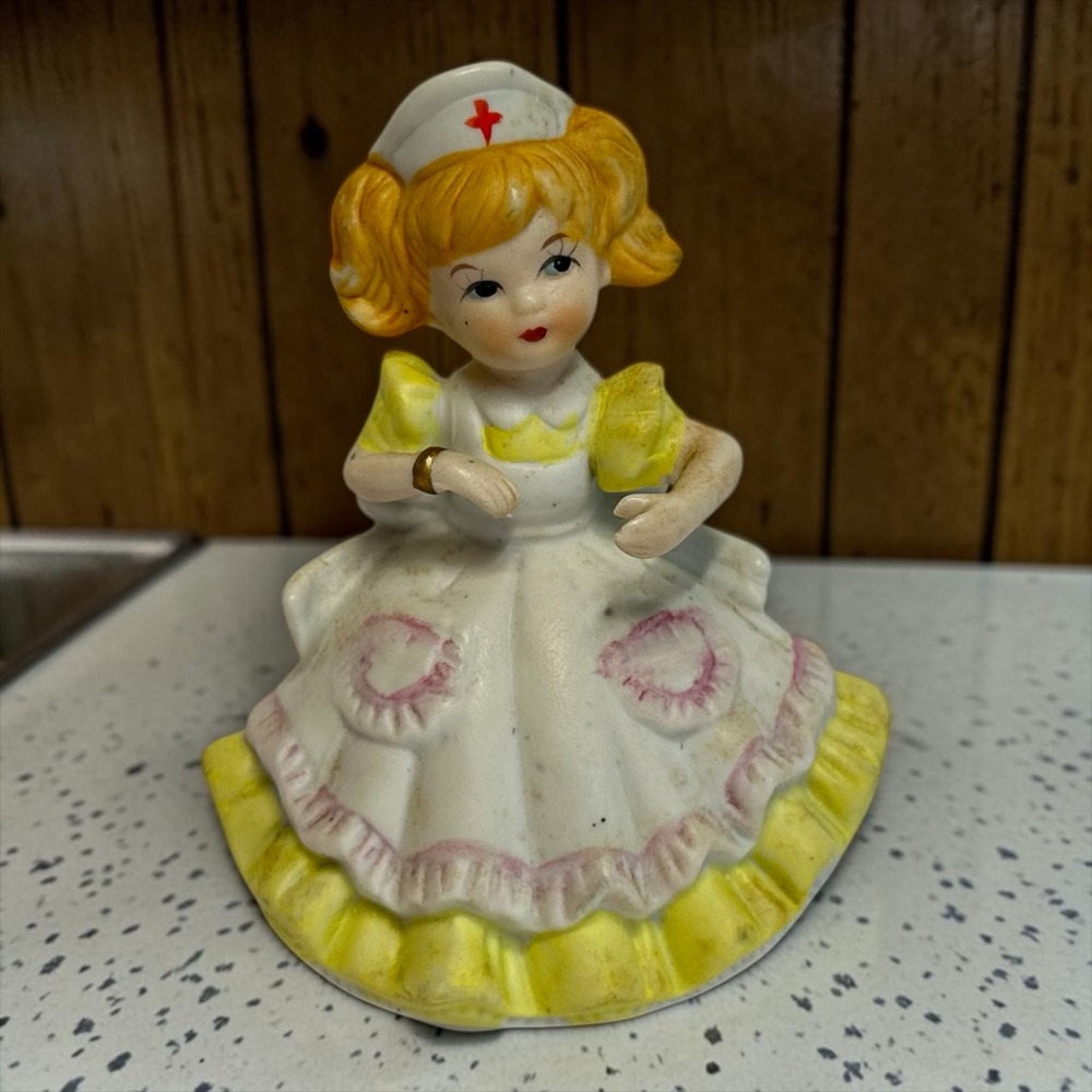 UGGC Vintage Nurse Figurine Girl Yellow White Hand‎ Painted Ceramic